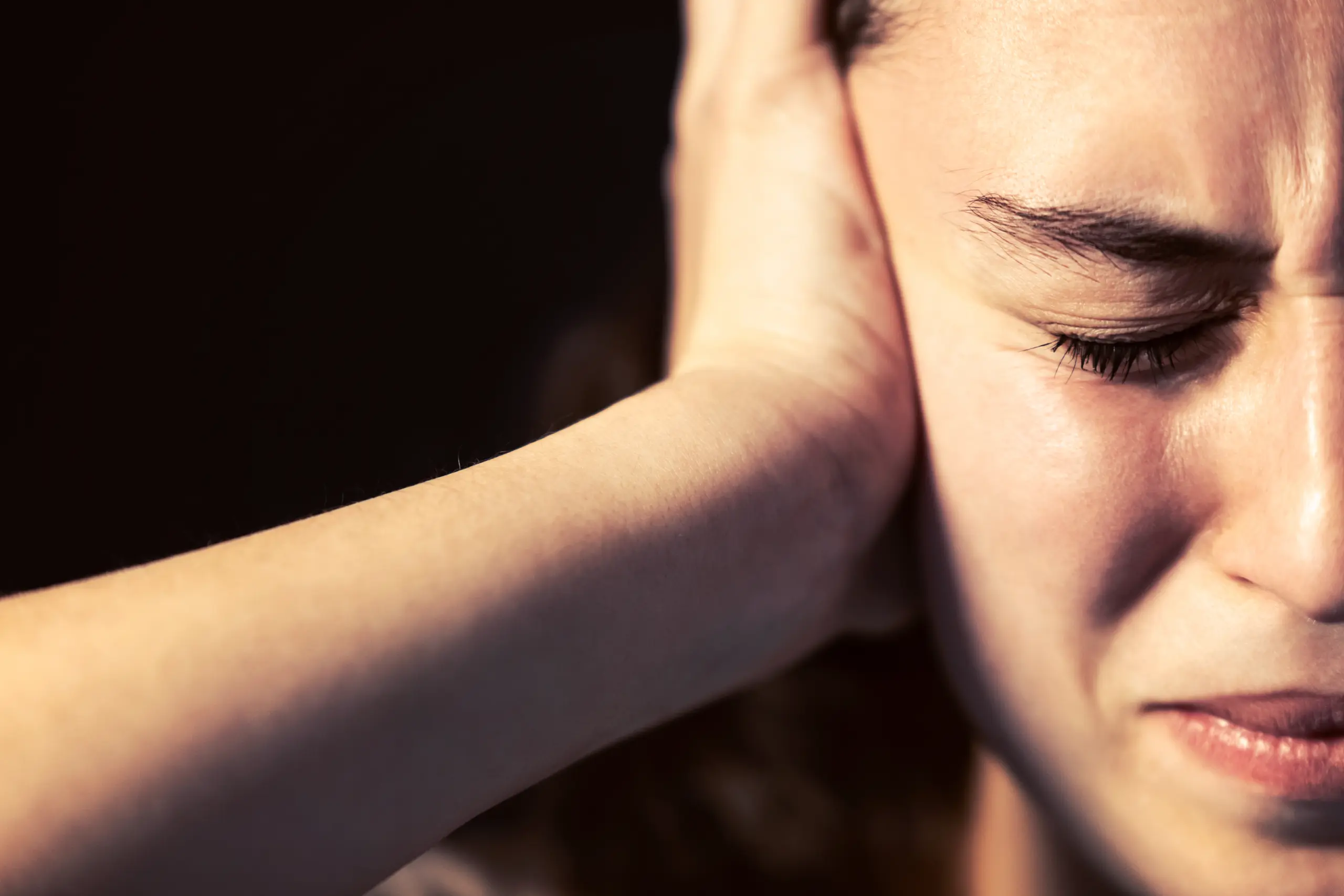 Photo,Of,A,Young,Woman,Close up,With,Headache,On,Black